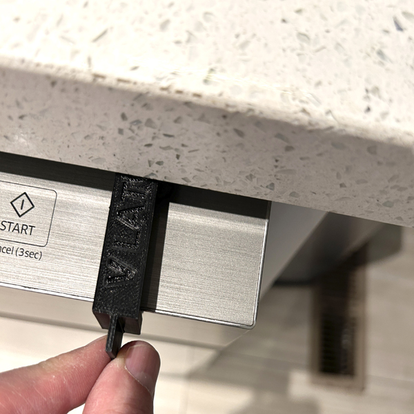 V Latch installed on dishwasher door as a vent latch